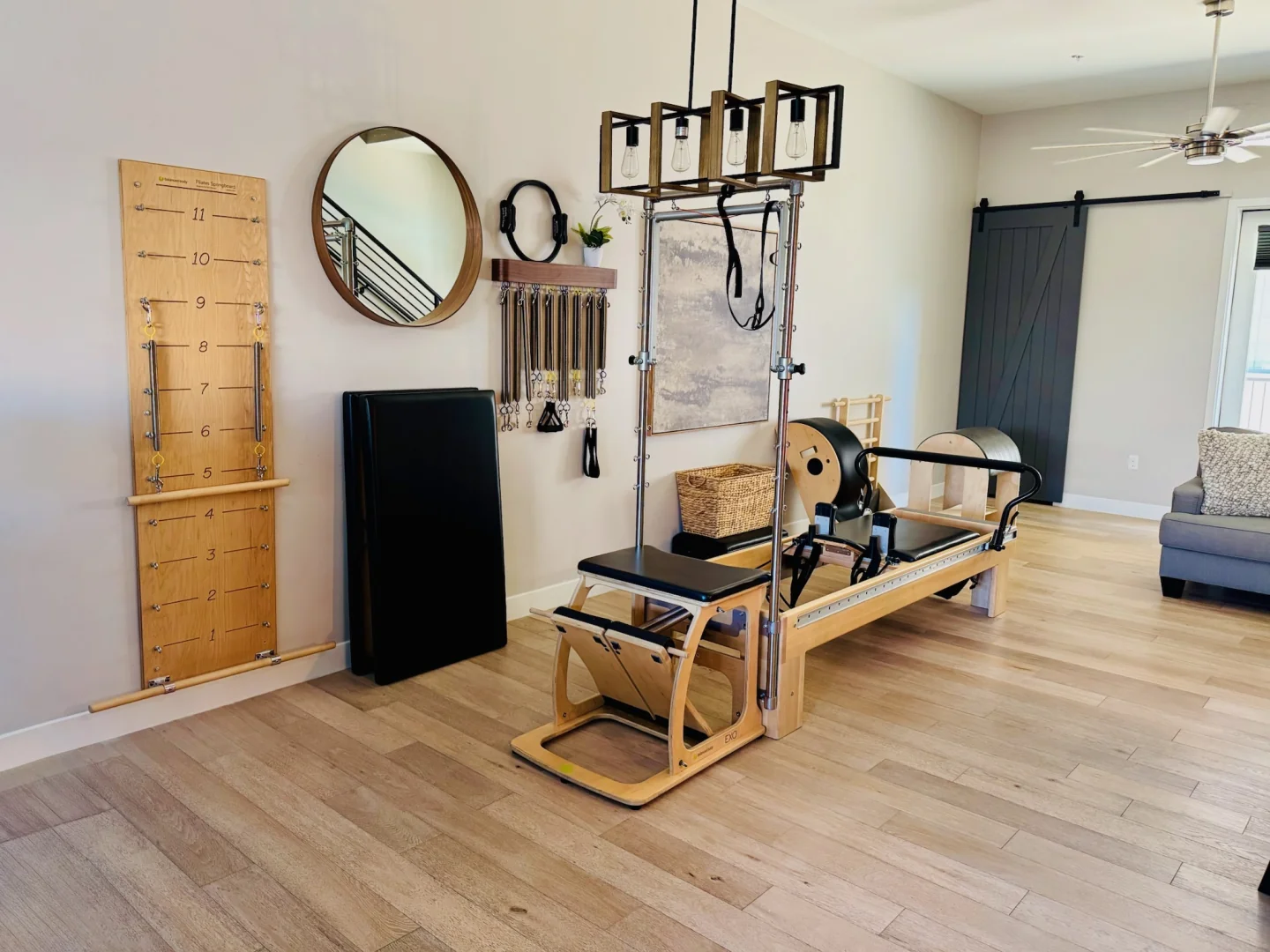 Wide view of the Quad Pilates studio with Cadillac, springboard, and Reformer