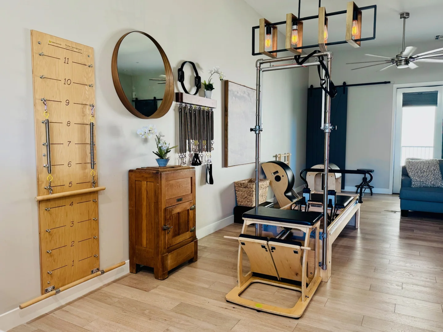 Studio view of the Cadillac tower, springboard, and Reformer